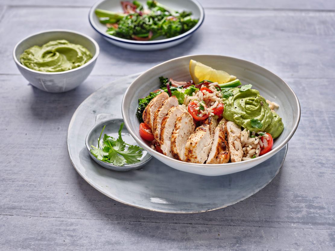 Warm Cajun Chicken Bowl with Rice and Avocado Dressing